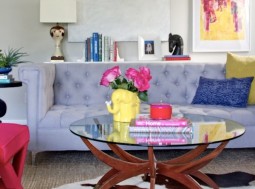 tufted couch with mid-century modern coffee table