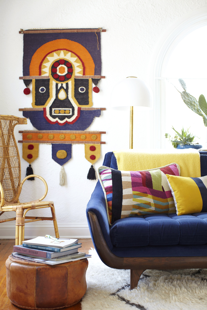 blue tufted sofa