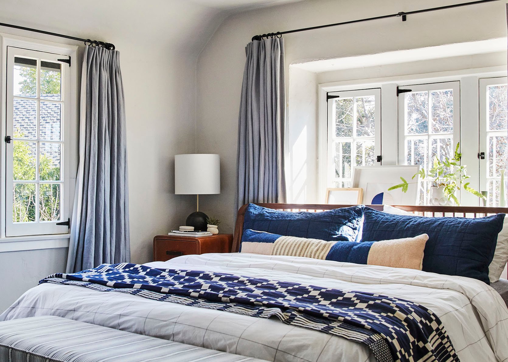 beds in front of windows